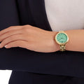 Swarovski Daytime Crystals Turquoise Dial Gold Steel Strap Watch for Women - 5182212