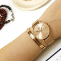 Daniel Wellington Petite Rose Gold Dial Rose Gold Mesh Strap Watch For Women - DW00100472
