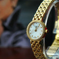 Tissot T-Lady Lovely Mother of Pearl Dial Gold Steel Strap Watch For Women - T058.009.63.116.00