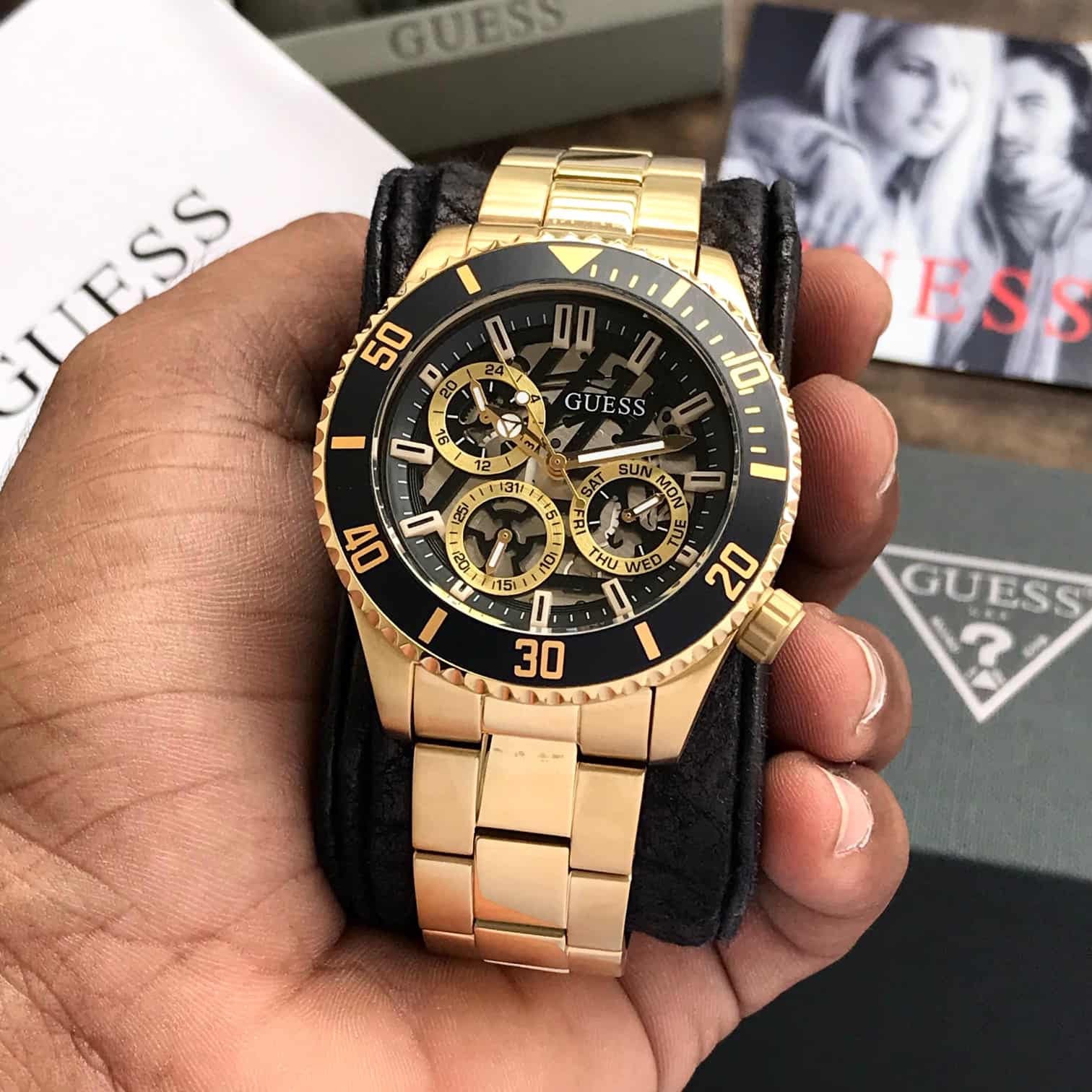 Guess Axle Multifunction Black Dial Gold Steel Strap Watch For Men - GW0488G2